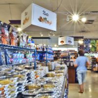 Hanging Wayfinding Signs - Johnny Pomodoros Grocery