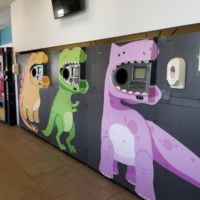 Dinosaur Themed Bottle Return Graphics - Heartland Marketplace