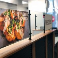 Interior glass print in Catrina's Taqueria restaurant