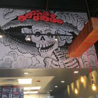 Giant skeleton graphic for Mexican steet food restaurant.