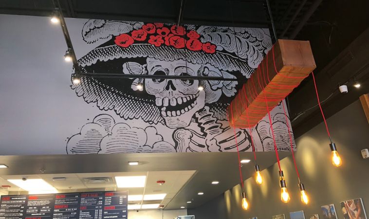 Giant skeleton graphic for Mexican steet food restaurant.