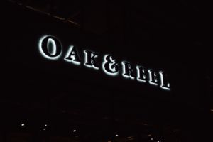 Oak & Reel Backlit Front-Facing Sign