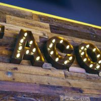 Tacos Light Sign Installation at Carnival Market